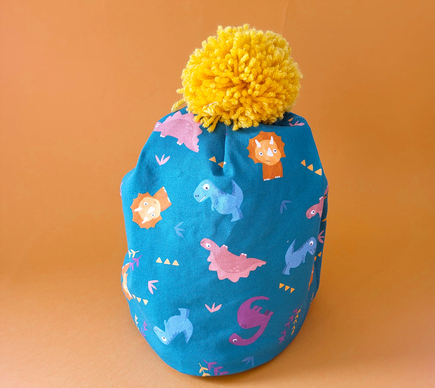 Cappellino con pom pom